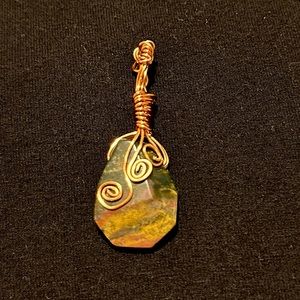 Bloodstone pendant with spirals